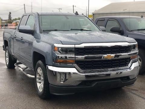 Chevrolet Silverado pickup truck parked in a dealership lot